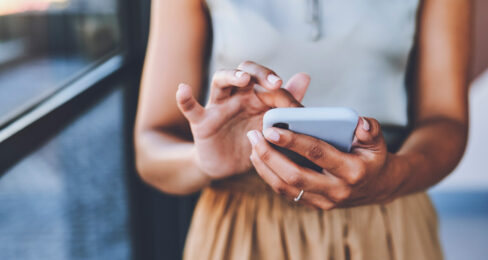 Woman holding a mobile phone